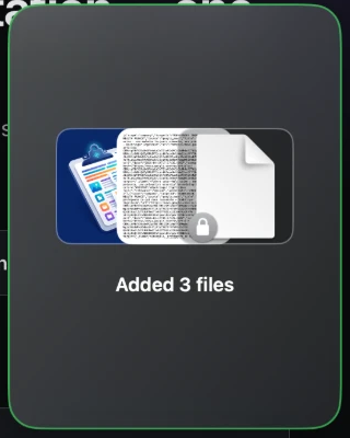 File shelf mid drag-in, showing “Added 3 files”